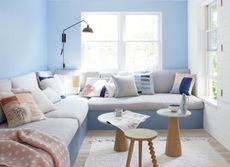 A living room painted blue