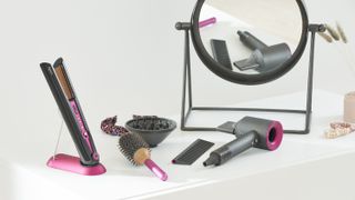 Children playing with Dyson haircare toys