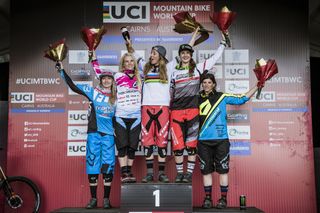 Rachel Atherton stands atop the Cairns World Cup podium