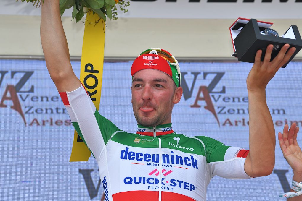 Elia Viviani on the stage 4 podium at Tour de Suisse