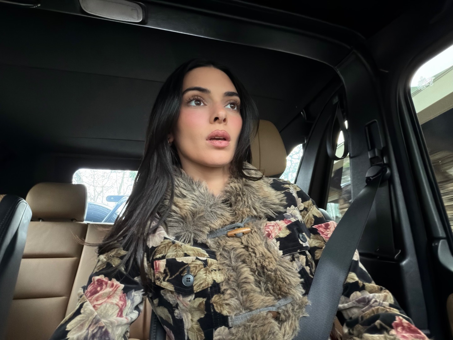 A selfie of Kendall Jenner in the car.