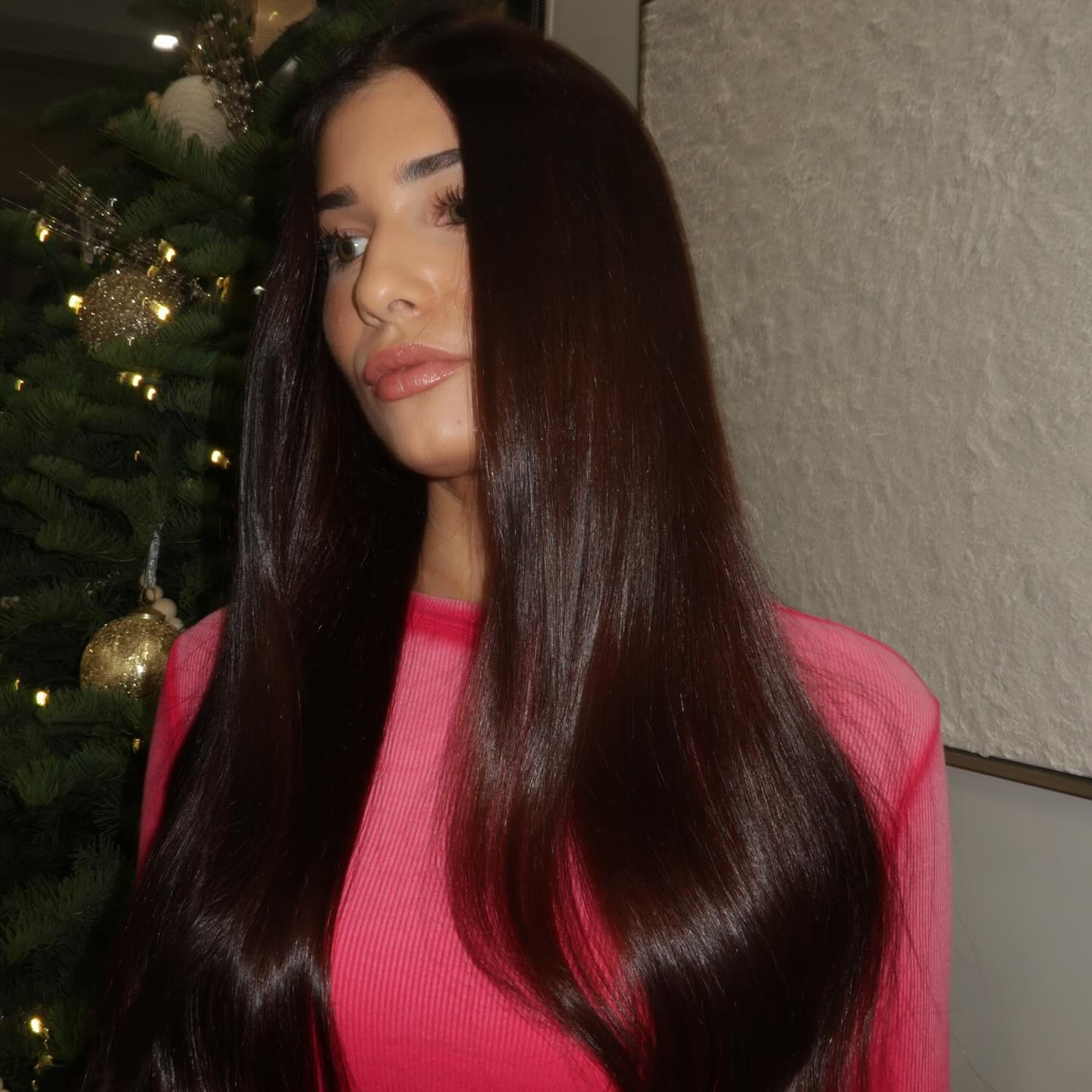 Woman with rich tobacco-colored hair.