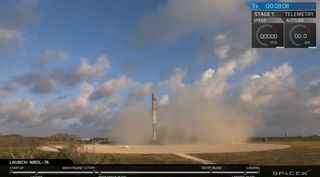 SpaceX's Falcon 9 rocket first stage stands atop its Landing Zone 1 pad at Cape Canaveral Air Force Station after successfully launching the classified NROL-76 satellite into orbit from NASA's Kennedy Space Center on May 1, 2017..
