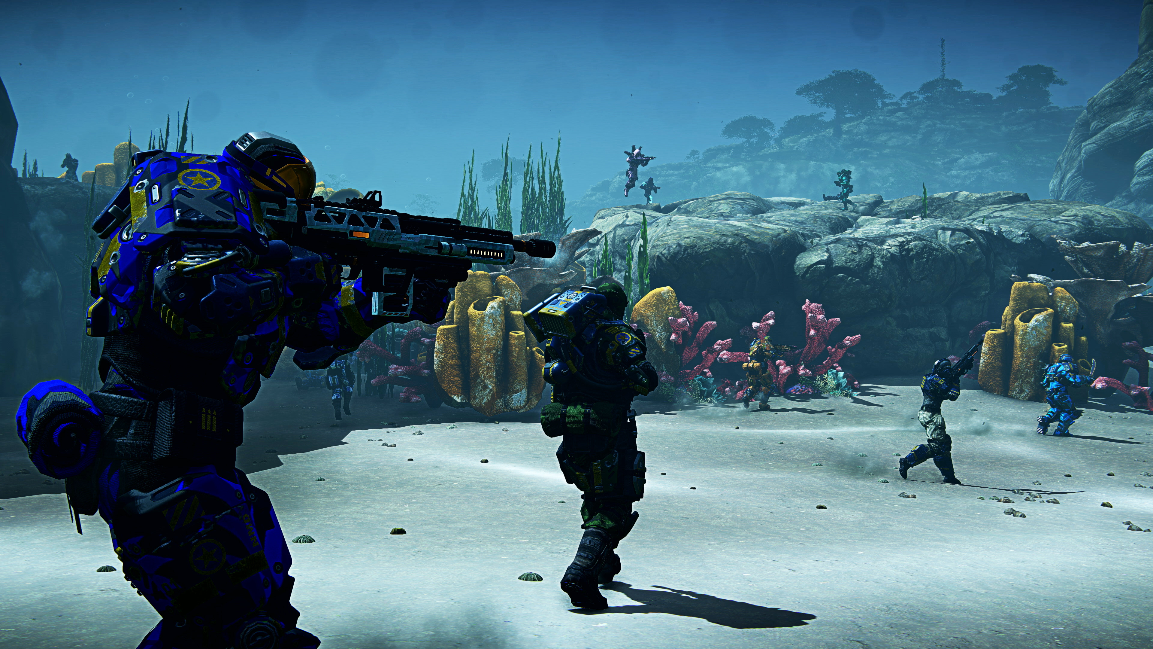 best MMO games: a group of soldiers advancing on the bottom of the sea