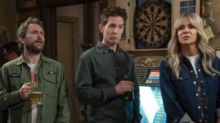 Charlie, Dennis and Dee standing in the bar holding drinks in It's Always Sunny in Philadelphia Season 17