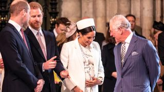 The Meghan, Duchess of Sussex talks with King Charles at the Westminster Abbey Commonwealth day service on March 11, 2019 in London, England