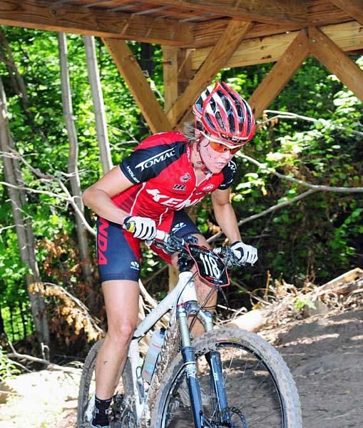 Heather Holmes (Kenda-Tomac-Titus) rides under one of the flyovers.