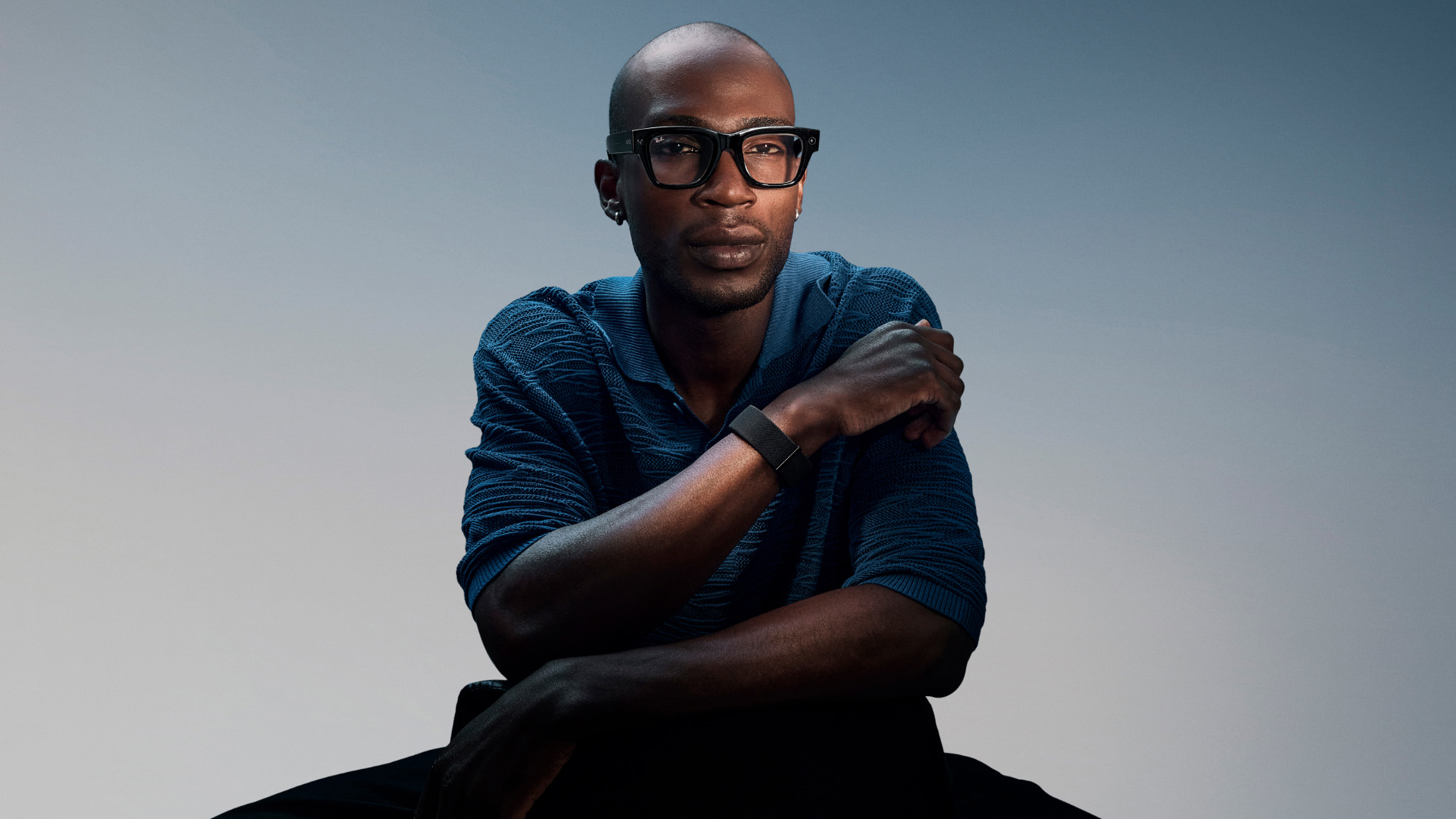 An official lifestyle shot of someone wearing Meta Ray-Ban Display Glasses