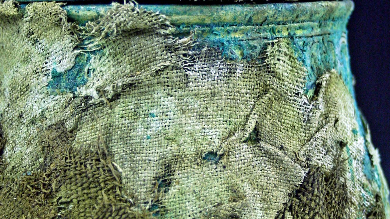 Detail of textiles wrapping the lidded vessel from the Galloway Hoard.