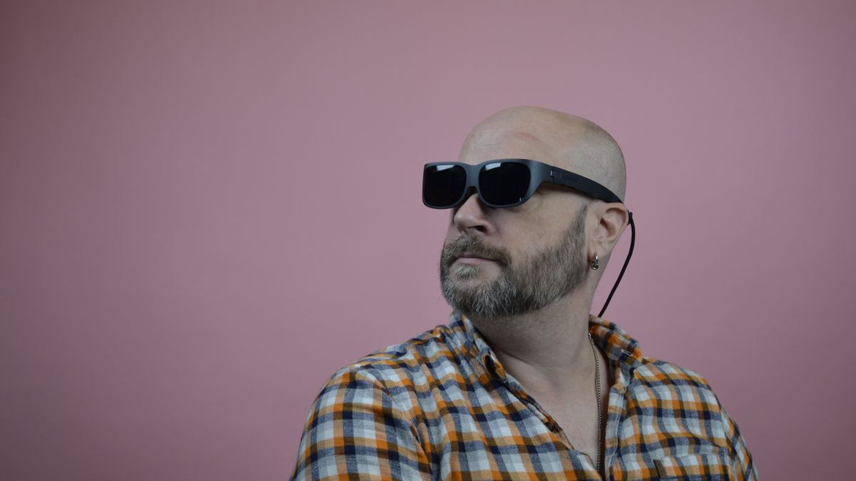 Editor John Loeffler wearing Lenovo Legion Glasses