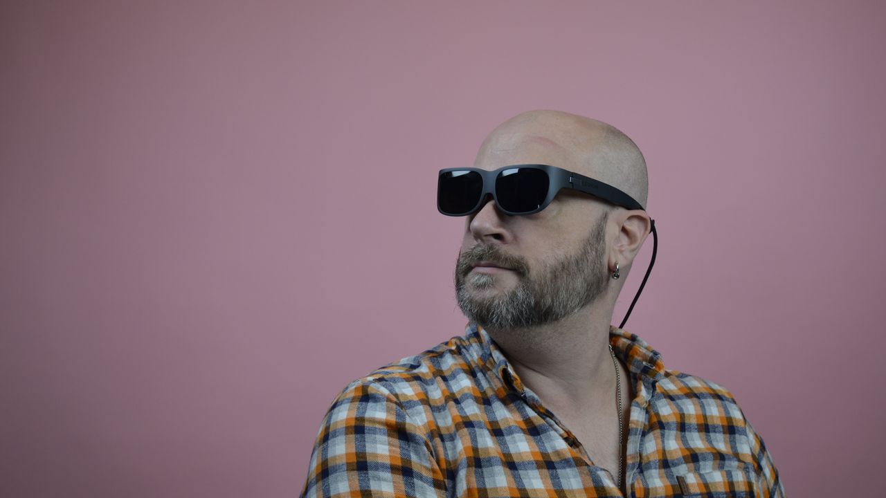 Editor John Loeffler wearing Lenovo Legion Glasses