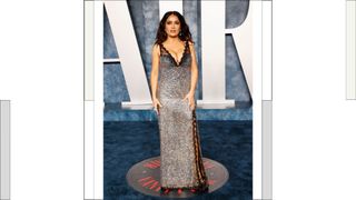Salma Hayek wears a black and silver gown as she attends the Vanity Fair 95th Oscars Party at the The Wallis Annenberg Center for the Performing Arts in Beverly Hills, California on March 12, 2023.