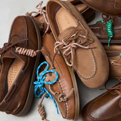 a pile of Sperry shoes from the collaboration with Aritzia in a pile