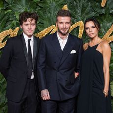Victoria, David and Brooklyn Beckham attend the Fashion Awards in 2018