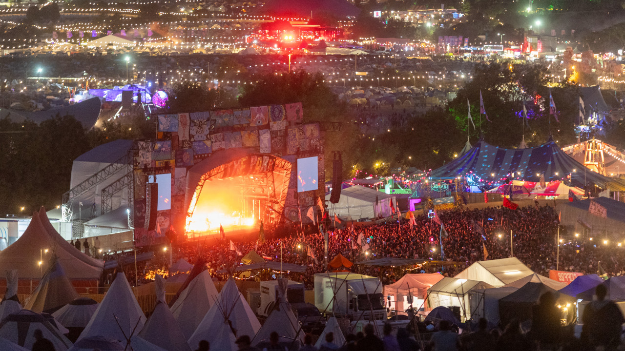 A shot of the Glastonbury 2024 festival site at night
