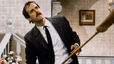 John Cleese plays Basil Fawlty in the 1970s TV sitcom Fawlty Towers