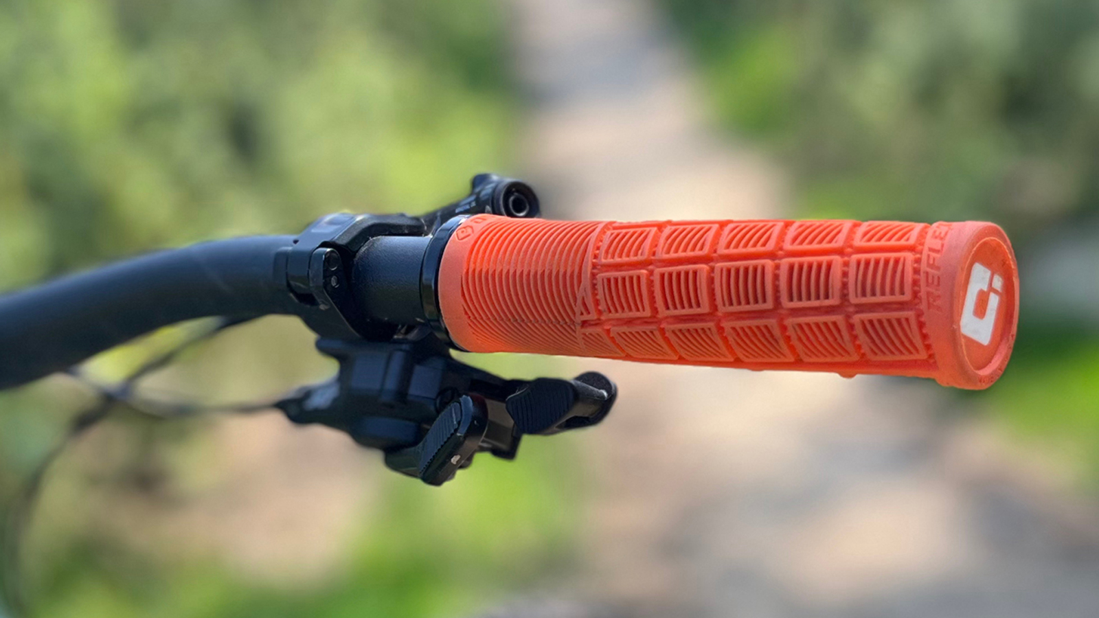 An ODI Reflex grip fitted to a handlebar on an MTB