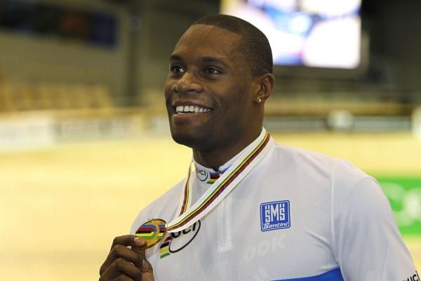 Gregory Bauge (France) shows off his new medal after winning the men's sprint.