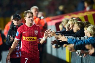Andreas Schjelderup of FC Nordsjalland shaking hands with fans during the Danish 3F Superliga match between FC Nordsjalland and AC Horsens at Right to Dream Park on October 28, 2022 in Farum, Denmark.