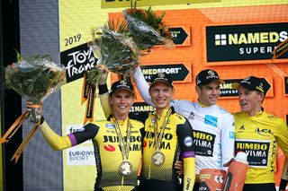 Jumbo-Visma's Amund Grondahl Jansen, Tony Martin, Wout Van Aert, Mike Teunissen on the podium at the Tour de France