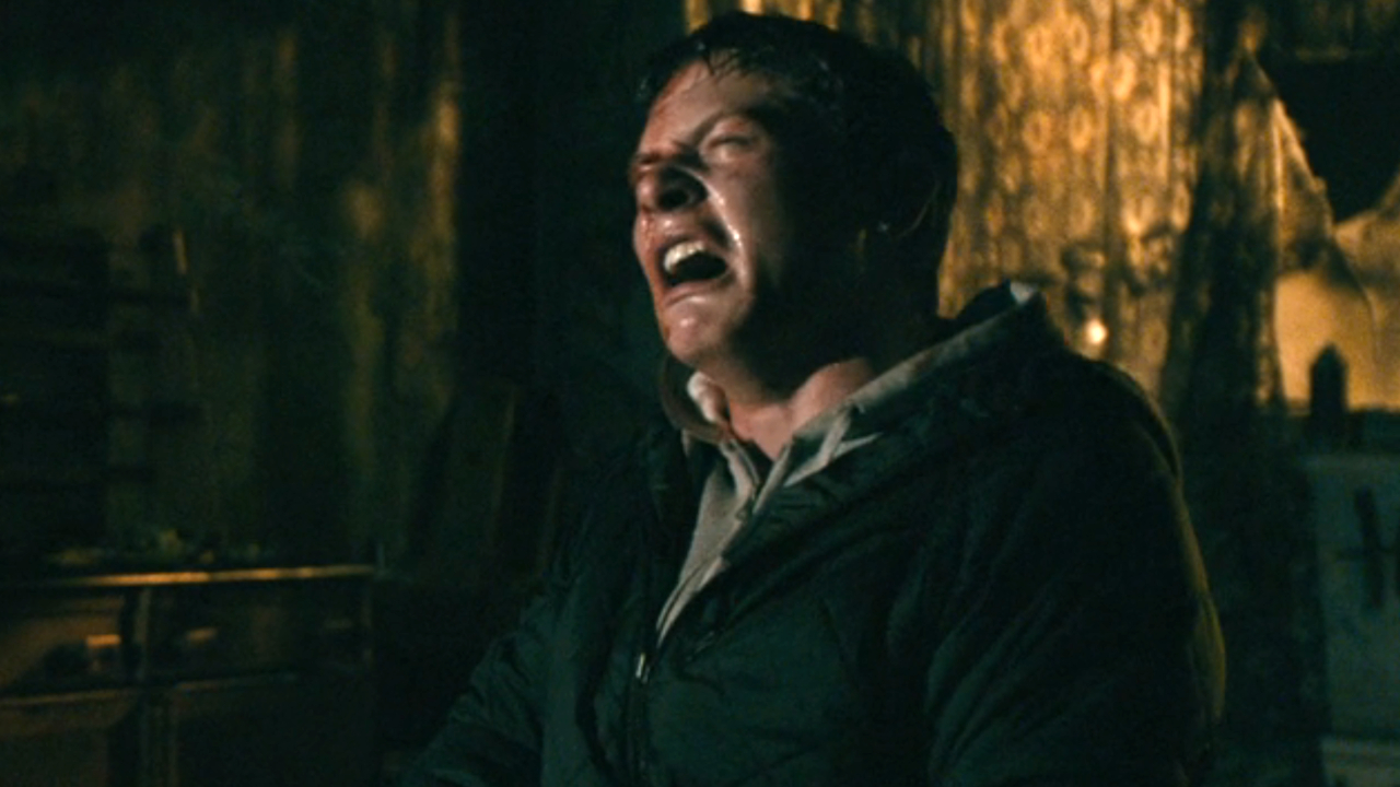Jack O'Connell crying in pain while tied to a chair in Harry Brown.