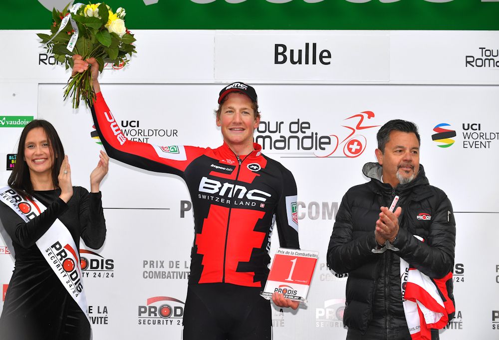 Stefan kung on the podium after winning stage 2 at the Tour de Romandie