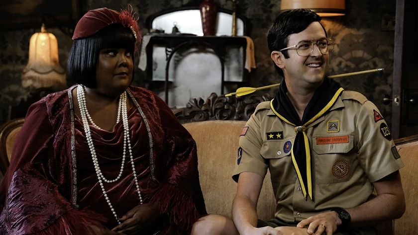 Romance blossoms between lounge singer Alberta (Danielle Pinnock) and youth group leader Pete (Richie Moriarty) as they sit knee-to-knee on an ornate sofa in Woodstone Manor&#039;s living room for Ghosts season 5.