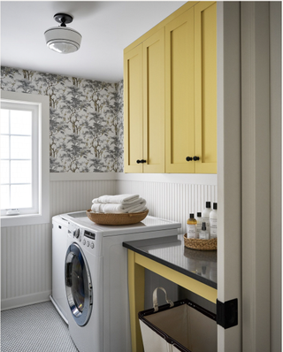 Yellow utility room with black and white wallpaper