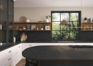 A kitchen with a dark worktop