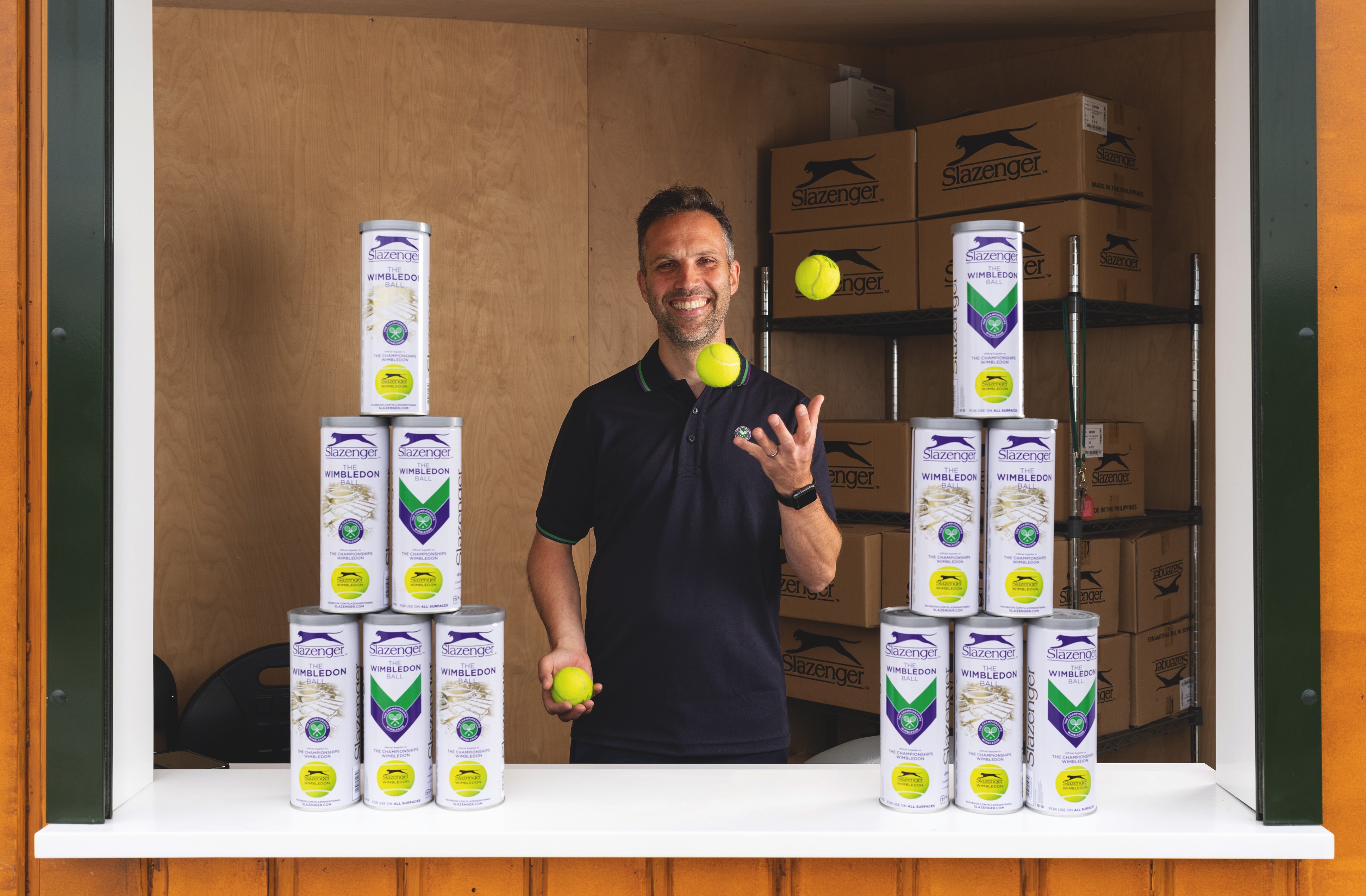 Andrew Chevalier - Ball Distribution Manager at The Championships juggles some tennis balls