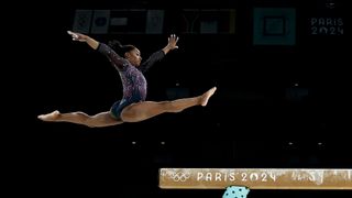 US gymnast Simone Biles leaps onto the beam in a training session before the Paris 2024 Olympic Games, on 25 July 2024 in Paris