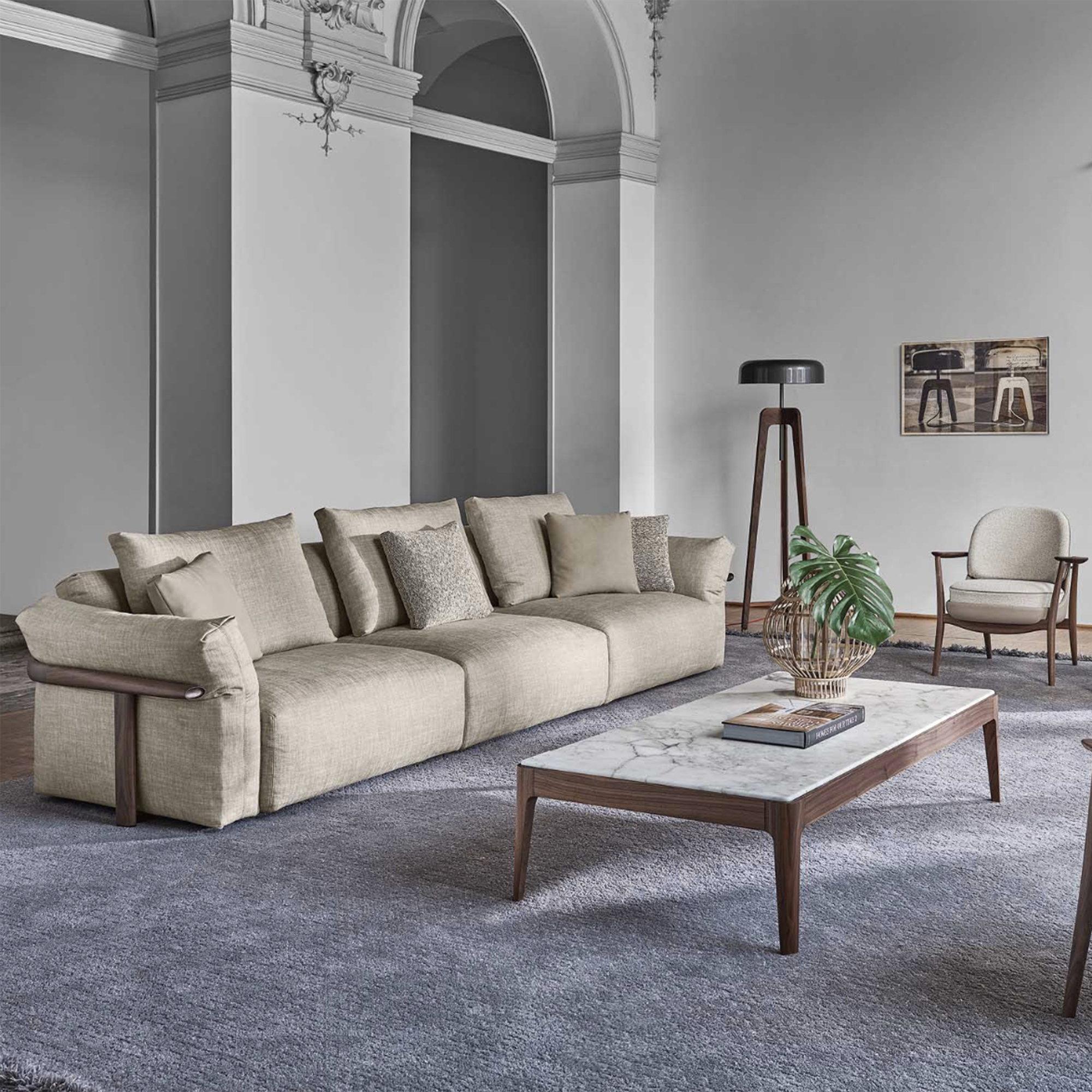 large cream sofa in a large grey living room