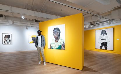 Artist Amoako Boafo with his exhibition, ‘Soul of Black Folks’ at San Francisco’s Museum of the African Diaspora.