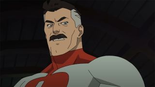 Still from the adult animated superhero T.V. show Invincible. A stern-faced adult man is looking down. He has short dark hair, graying at the sides, strong dark eyebrows and a thick moustache. HE is wearing a skintight superhero suit in white and red.