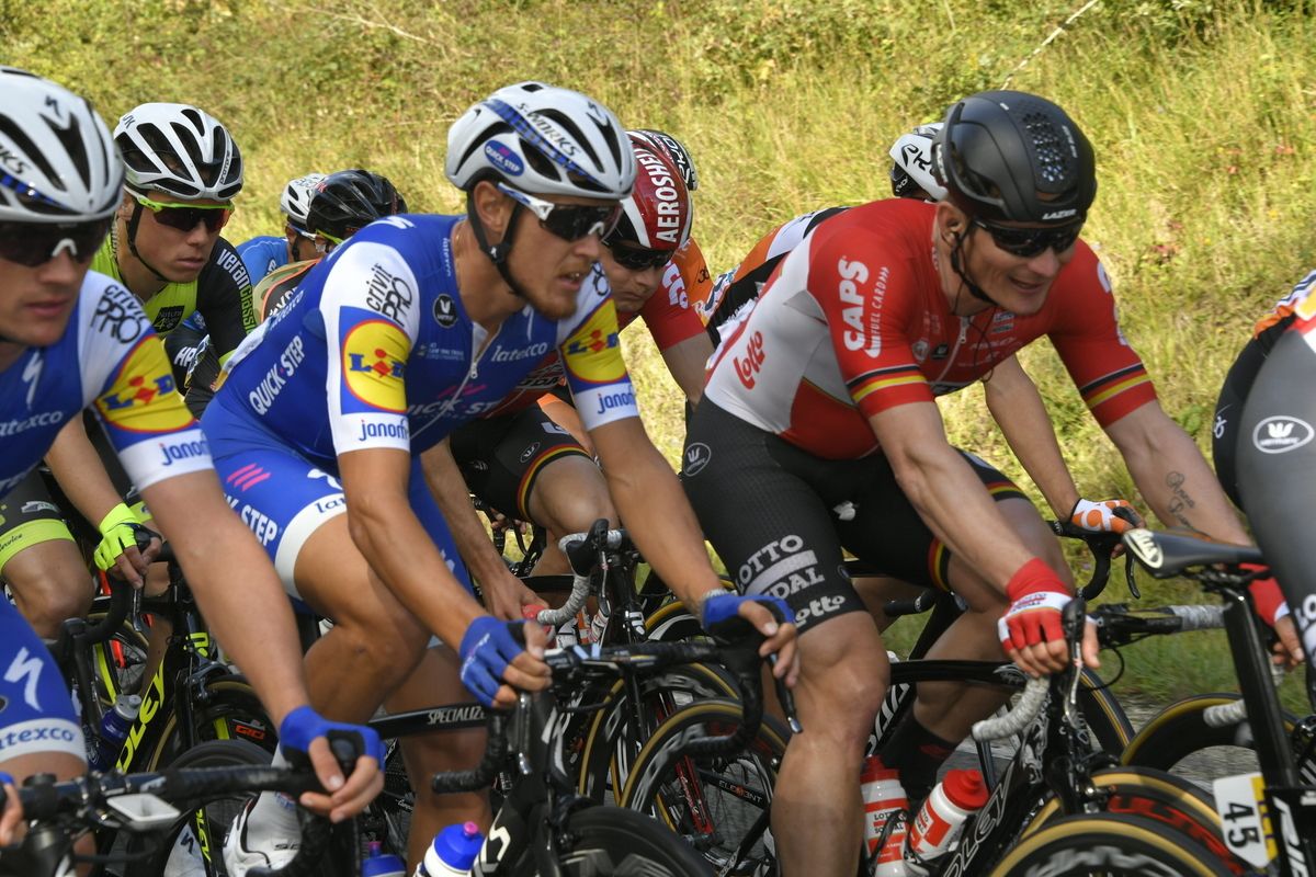 Matteo Trentin (Quick-Step Floors) and Andre Greipel (Lotto Soudal) chat in the bunch