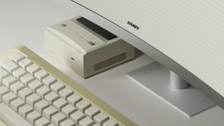 Official render of the Ayaneo AM01 Mini PC design, to scale with monitor and keyboard.