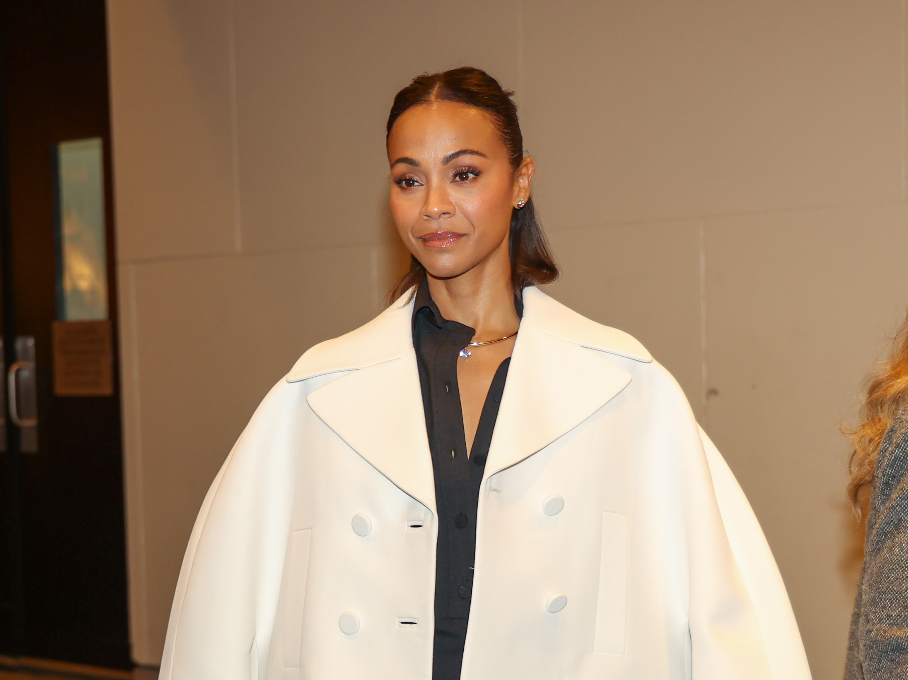 Zoe Salda&amp;ntilde;a attending an event