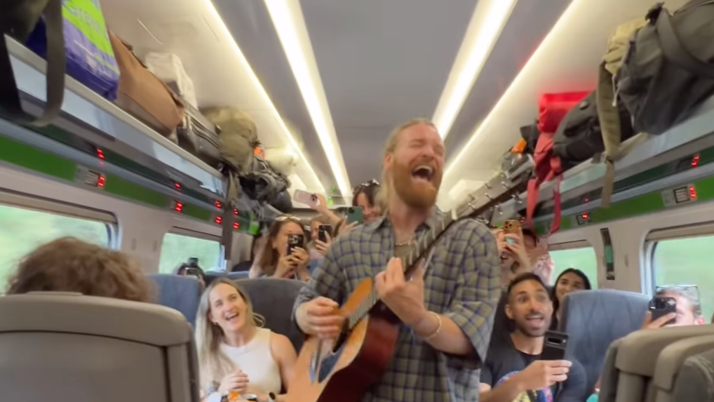 Sam Ryder on a train