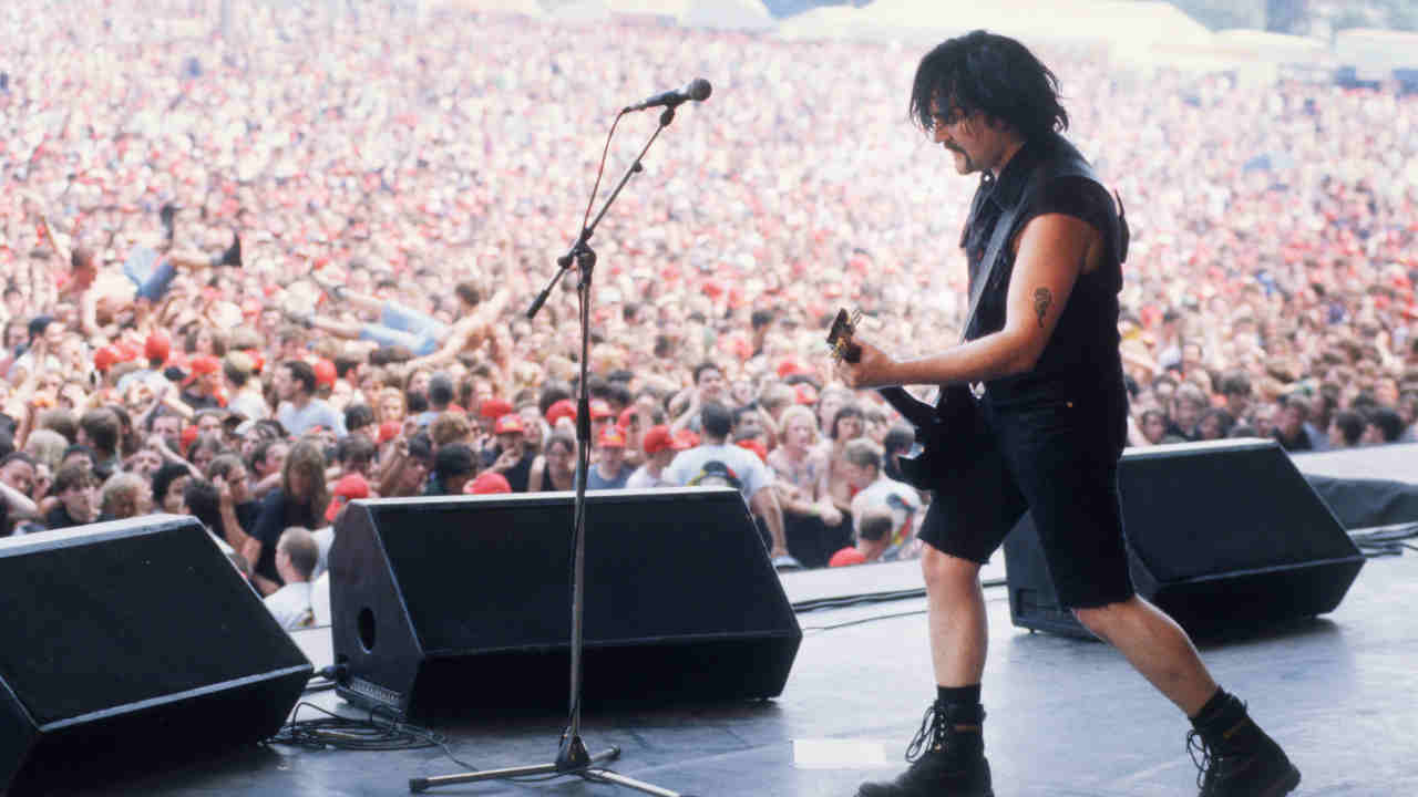 Therapy?&amp;rsquo;s Andy Cairns performing onstage at a festival in 1994