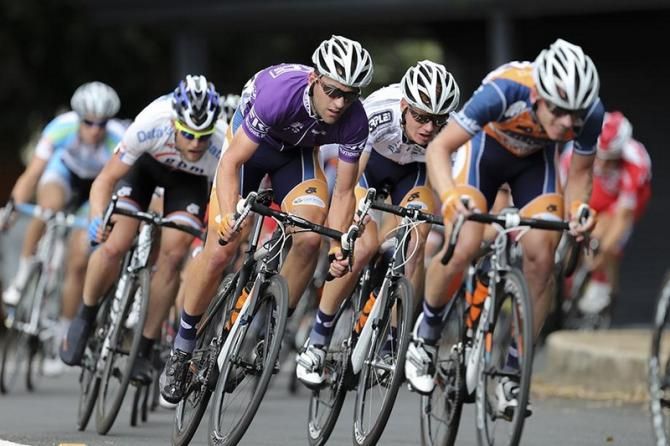 Race leader Nathan Earle (Huon - Genesys) sits behind his teammates with overall victory assured