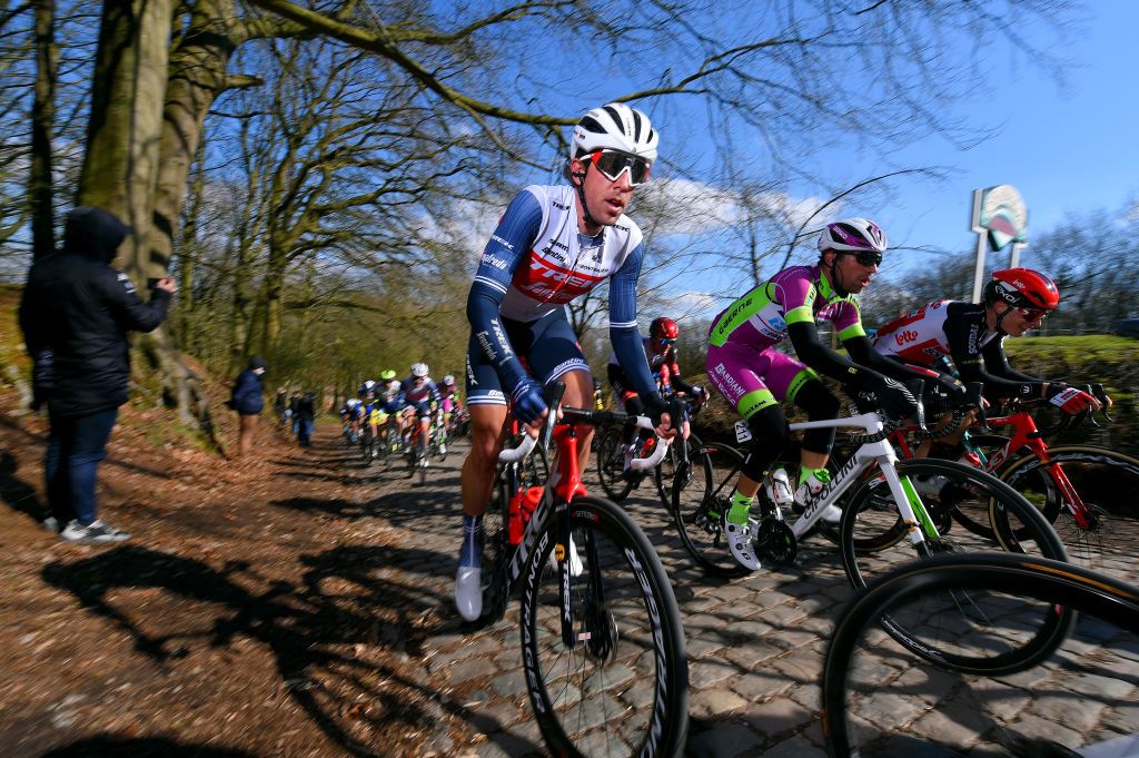 KOKSIJDE BELGIUM MARCH 19 Koen De Kort of Netherlands and Team Trek Segafredo Nicolas Dalla Valle of Italy and Team Bardiani CSF Faizane Matthew Holmes of United Kingdom and Team Lotto Soudal during the 19th Bredene Koksijde Classic 2021 a 199km race from Bredene to Koksijde Cobblestones Kemmelberg BredeneKoksijde on March 19 2021 in Koksijde Belgium Photo by Luc ClaessenGetty Images
