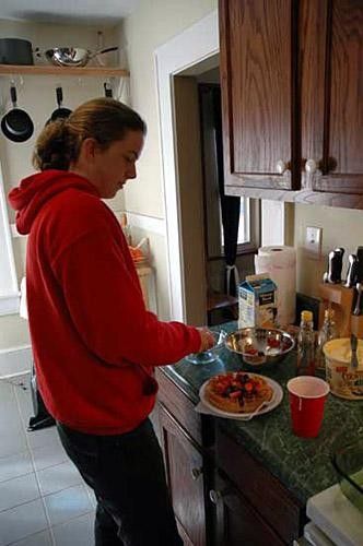 Kim Geist prepares breakfast