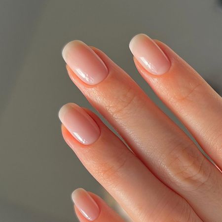 A close-up of a neat, natural-looking manicure