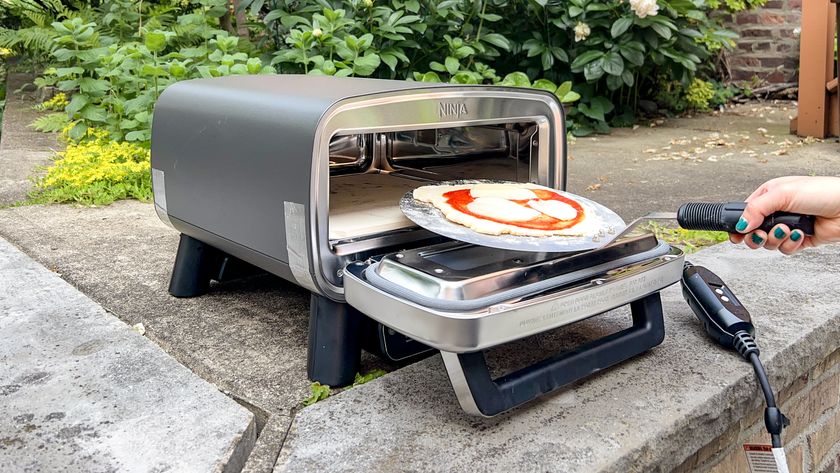 Ninja Artisan Outdoor Pizza Oven in a back yard