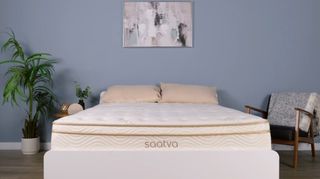 The Saatva Classic mattress photographed in our Sleep Product Testing Lab. Image clearly shows the Euro pillow top of the mattress, plus the luxurious gold edging of this luxury innerspring hybrid.