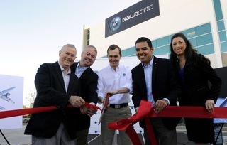 Virgin Galactic's CEO George Whitesides is joined by (from left) California Congressman Dana Rohrabacher, California Assemblyman Patrick O'Donnell, Long Beach Mayor Robert Garcia and Long Beach Council Member Stacy Mungo as they officially open Virgin Galactic's newest facility. Dedicated to the satellite launch vehicle, LauncherOne, the plant was christened on Saturday, March 7 in Long Beach, California.