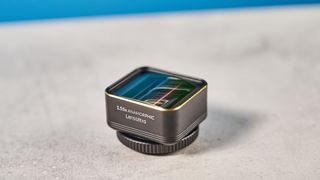 A photo of a ShiftCam LensUltra iPhone lens in black