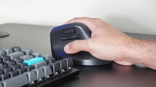 A person using the Keychron M5 vertical mouse