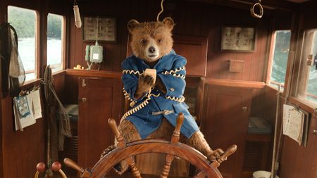 Paddington in Peru VFX; a bear tied in rope steering a boat wheel