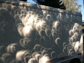 Eclipse Projections on a Wall